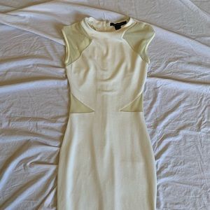 French Comnection Bodycon dress with sheer pieces. midi length